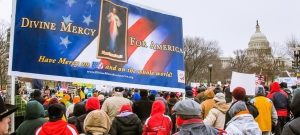 Divine Mercy for America rally showing people and banners.
